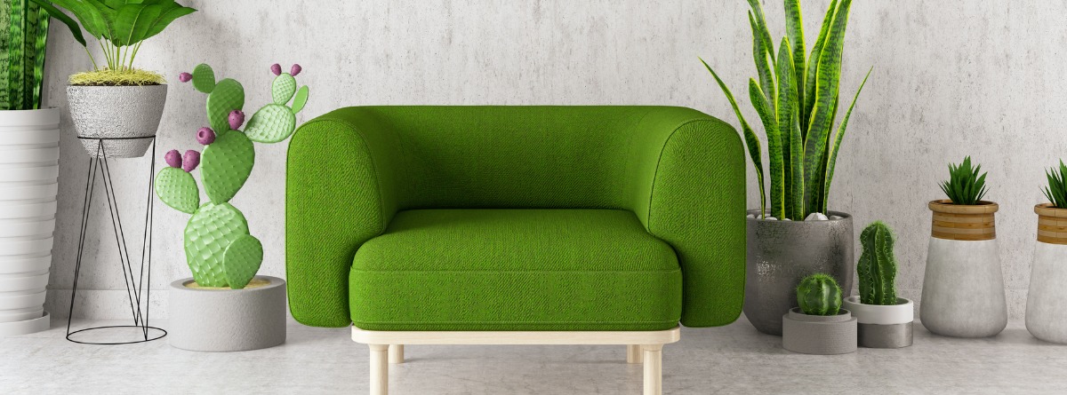 sillón verde y pared blanca