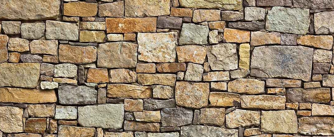 Revestir una pared exterior con piedra